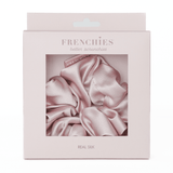 Large oversized pink 100% mulberry silk scrunchie by Frenchies Hairpins for thick hair protection.