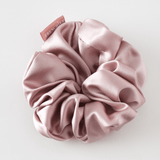 Large oversized mauve, light pink 100% mulberry silk scrunchie by Frenchies Hairpins for thick hair protection.